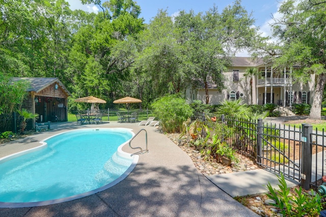 2494 Cape Rd, Johns Island, SC 29455 - view of swimming pool with a patio, an outdoor structure, and outdoor dining space