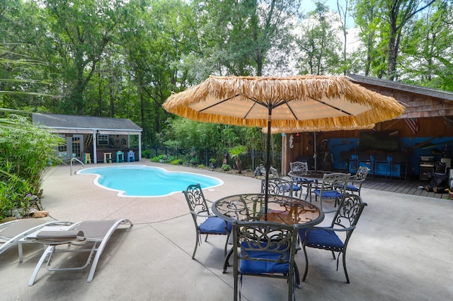 2494 Cape Rd, Johns Island, SC 29455 - view of pool with an outdoor structure, outdoor dining space, an exterior structure, and a patio