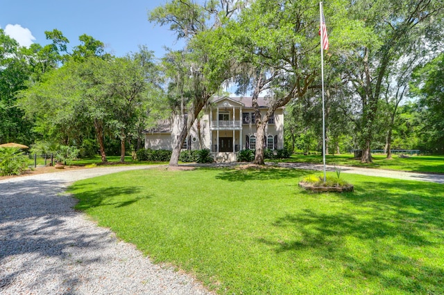 2494 Cape Rd, Johns Island, SC 29455 - greek revival inspired property with a balcony, a front yard, and curved driveway