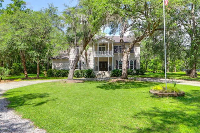 2494 Cape Rd, Johns Island, SC 29455 - greek revival inspired property featuring a balcony, a front yard, french doors, and curved driveway