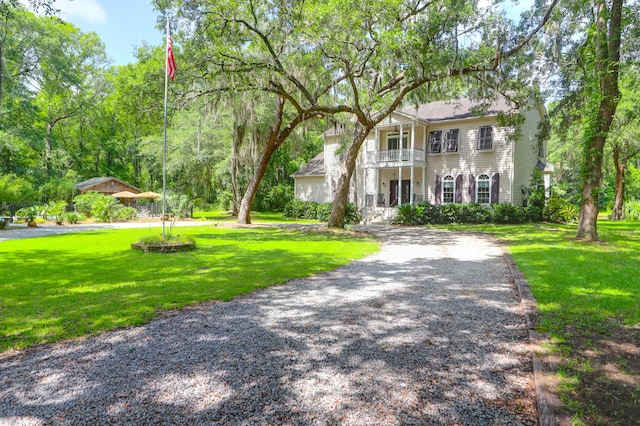 2494 Cape Rd, Johns Island, SC 29455 - view of front facade with a balcony and a front lawn