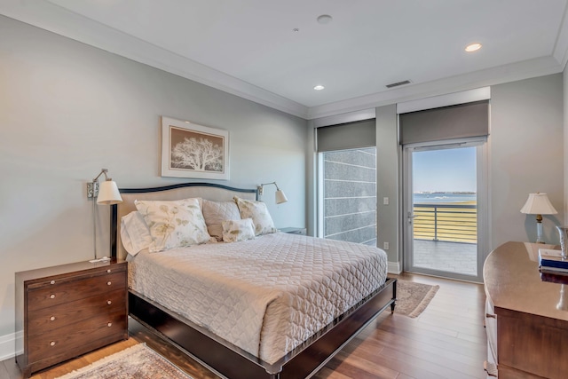 bedroom with crown molding, access to exterior, and light wood-type flooring