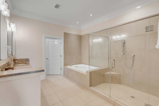 bathroom with tile patterned flooring, ornamental molding, and separate shower and tub