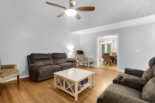 112 Fox Chase Dr, Goose Creek, SC 29445 - living room with a chandelier, light wood finished floors, a ceiling fan, and baseboards