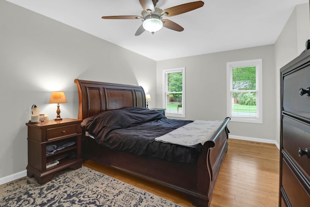 112 Fox Chase Dr, Goose Creek, SC 29445 - bedroom with baseboards, light wood-style flooring, and a ceiling fan