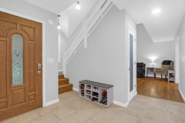 112 Fox Chase Dr, Goose Creek, SC 29445 - entryway featuring stairs, light tile patterned flooring, and baseboards