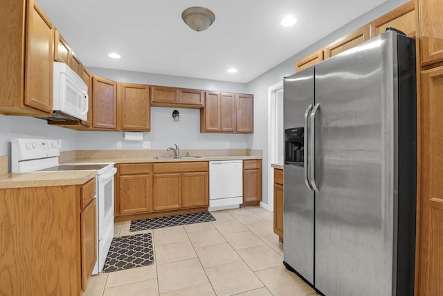 112 Fox Chase Dr, Goose Creek, SC 29445 - kitchen featuring white appliances, a sink, light countertops, light tile patterned floors, and recessed lighting