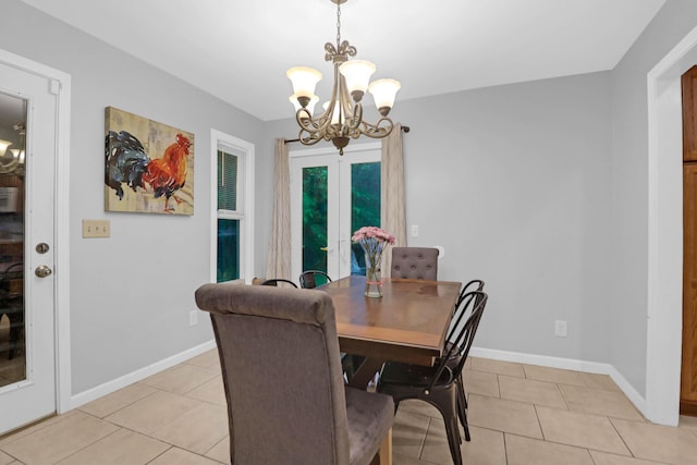112 Fox Chase Dr, Goose Creek, SC 29445 - dining room with a chandelier, light tile patterned flooring, and baseboards