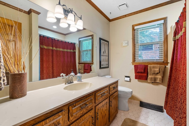 bathroom featuring ornamental molding, vanity, tile patterned flooring, and toilet