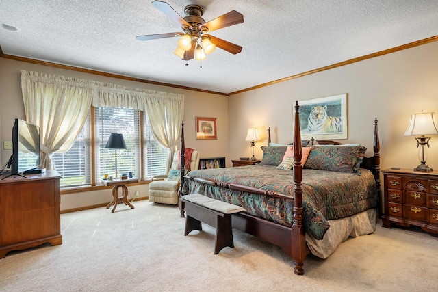 carpeted bedroom with ceiling fan, crown molding, and a textured ceiling