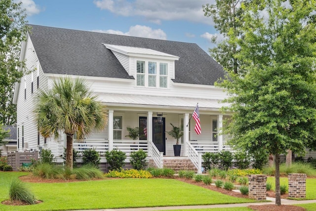 1903 Bolden Dr, Mount Pleasant, SC 29466 - view of front facade with covered porch, a front yard, and a shingled roof