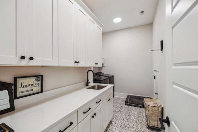1903 Bolden Dr, Mount Pleasant, SC 29466 - laundry room featuring cabinet space, washer and clothes dryer, recessed lighting, and light flooring
