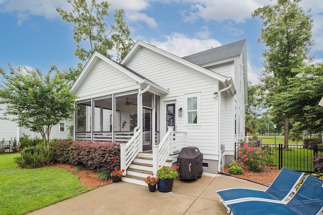 1903 Bolden Dr, Mount Pleasant, SC 29466 - view of front facade with ceiling fan, a sunroom, and a patio