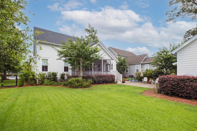 1903 Bolden Dr, Mount Pleasant, SC 29466 - rear view of house with a patio area and a sunroom