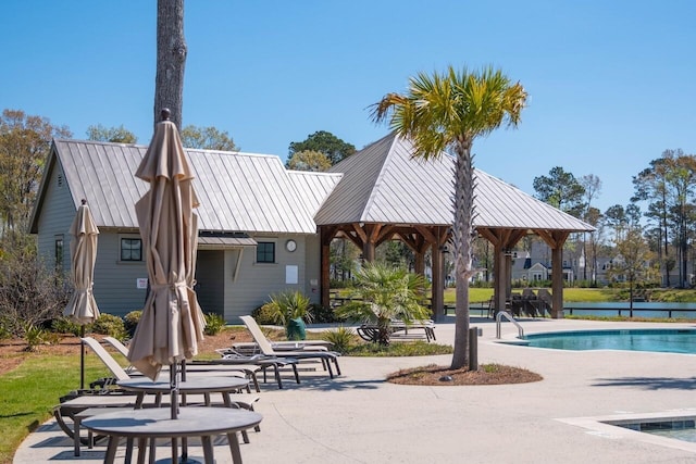 1903 Bolden Dr, Mount Pleasant, SC 29466 - back of property featuring a community pool, a patio, a metal roof, and a gazebo