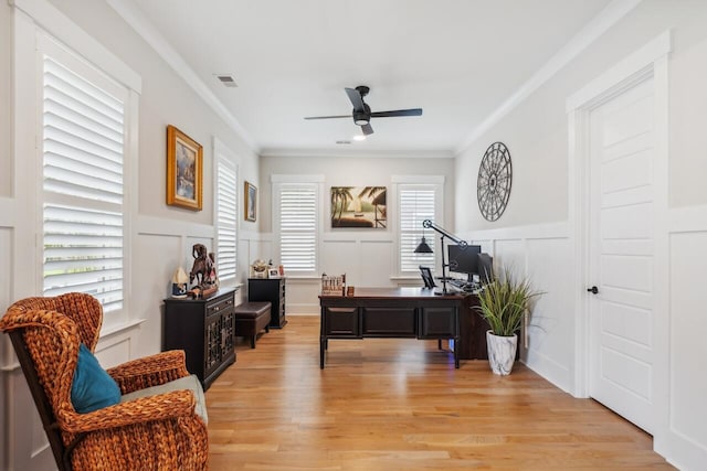 1903 Bolden Dr, Mount Pleasant, SC 29466 - office area featuring a decorative wall, ceiling fan, light wood-style flooring, crown molding, and wainscoting