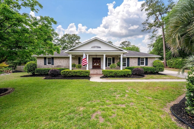 neoclassical / greek revival house with covered porch and brick siding