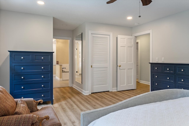 bedroom featuring light wood-style flooring, baseboards, a closet, recessed lighting, and a ceiling fan
