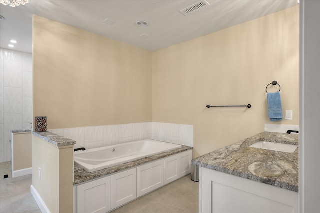 bathroom with a garden tub, vanity, recessed lighting, and a walk in shower