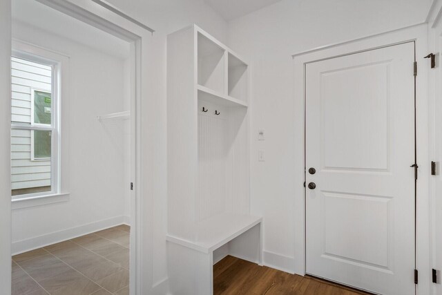 mudroom with wood-type flooring