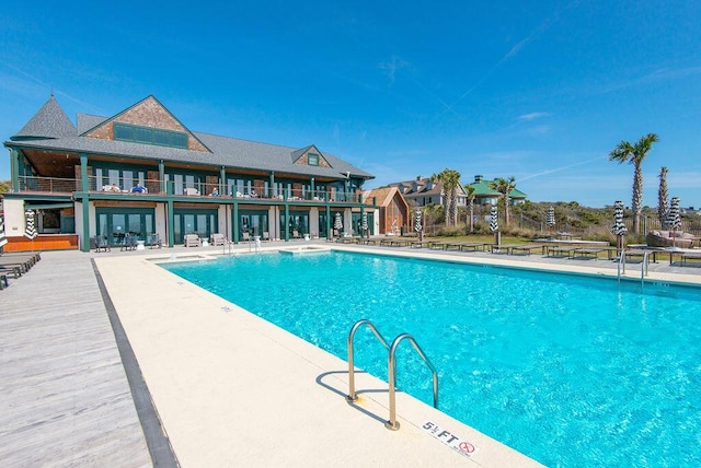 6002 Green Dolphin Way, Kiawah Island, SC 29455 - community pool featuring a patio area and french doors