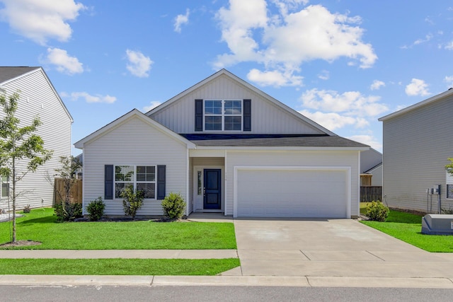 view of front of property featuring driveway and an attached garage