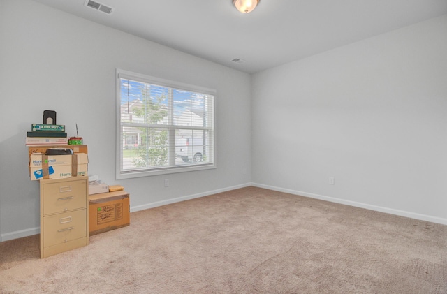 carpeted bedroom with baseboards