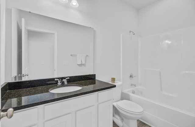 full bathroom with toilet, vanity, and bathtub / shower combination