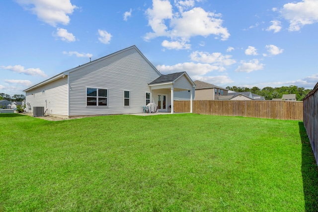 back of house with cooling unit, french doors, and a patio area