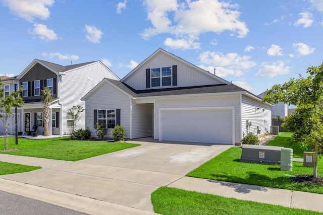 view of front of property featuring a front lawn, driveway, and central AC unit