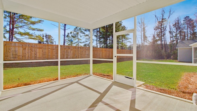 unfurnished sunroom with a wealth of natural light