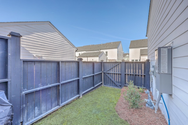 view of yard with a gate and fence