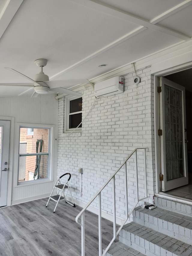 4029 Karen Dr, North Charleston, SC 29405 - entrance to property with an AC wall unit, brick siding, and a ceiling fan