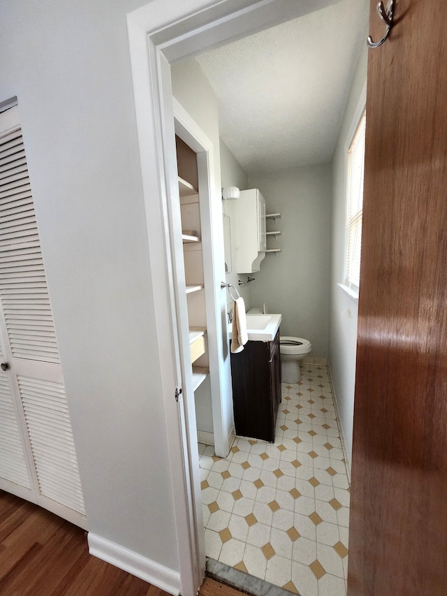 4029 Karen Dr, North Charleston, SC 29405 - bathroom with vanity, baseboards, tile patterned floors, and toilet