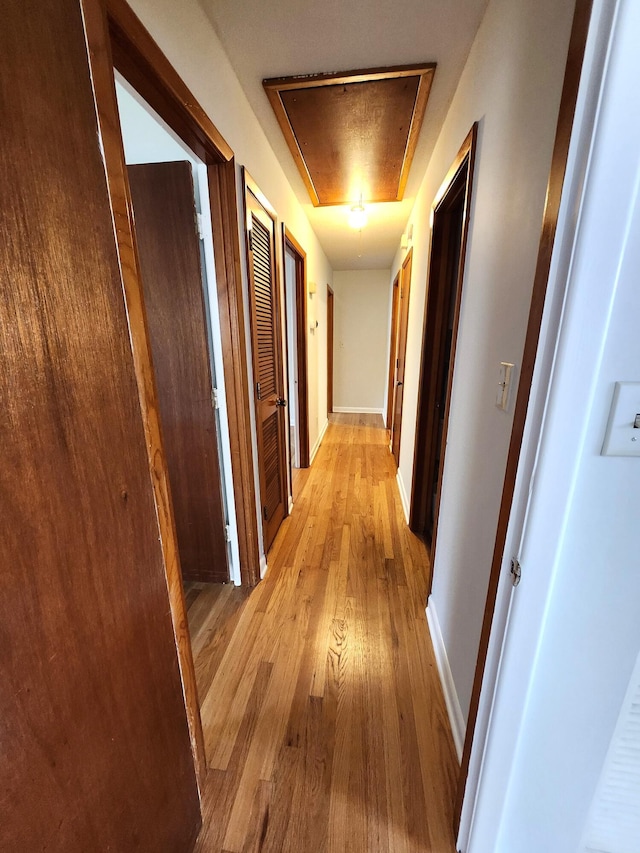 4029 Karen Dr, North Charleston, SC 29405 - hall with light wood-style flooring, baseboards, and attic access