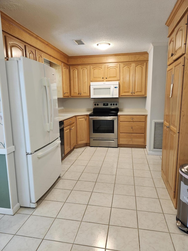 4029 Karen Dr, North Charleston, SC 29405 - kitchen with appliances with stainless steel finishes, light countertops, a textured ceiling, ornamental molding, and baseboards