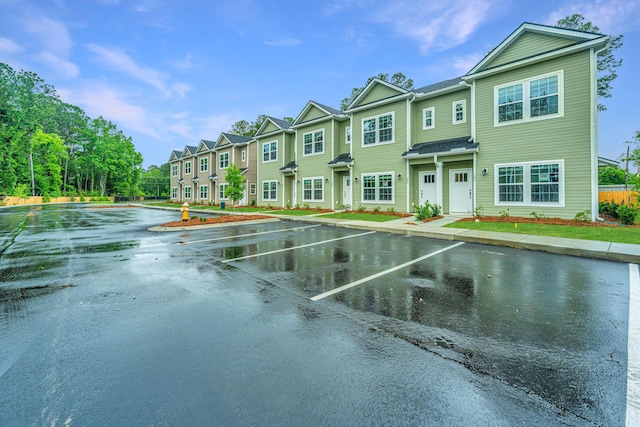 exterior space featuring uncovered parking