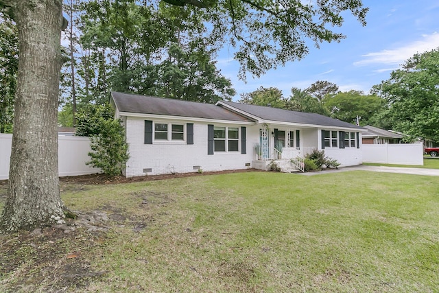ranch-style home with a front lawn, fence, brick siding, crawl space, and a porch