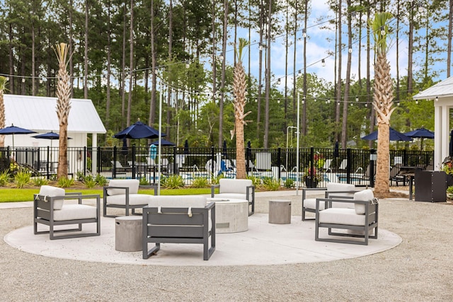 view of home's community featuring a patio area and fence