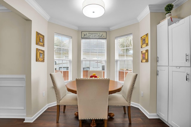 dining room with plenty of natural light, dark wood-type flooring, and crown molding