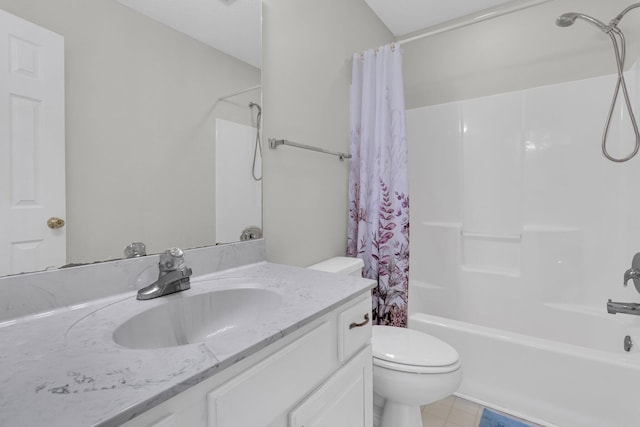 bathroom featuring shower / tub combo, vanity, and toilet