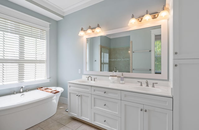 bathroom with crown molding, tile patterned floors, separate shower and tub, and vanity