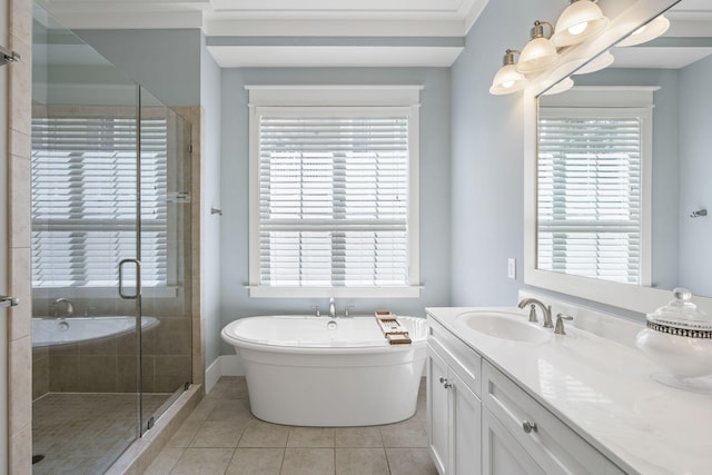 bathroom featuring vanity, shower with separate bathtub, and tile patterned flooring