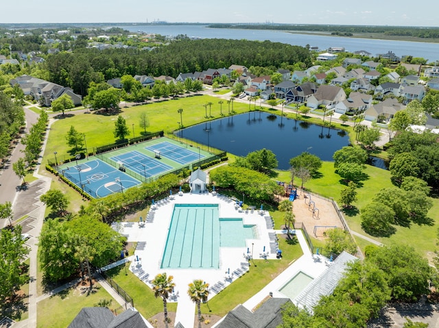 birds eye view of property featuring a water view