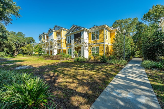 view of front of home with a front yard