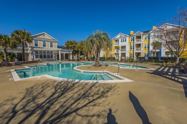 view of pool featuring a patio area