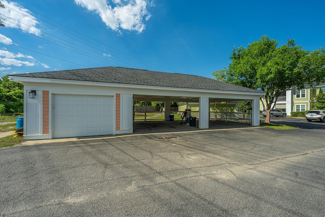 garage with a carport