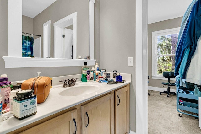 bathroom with vanity and walk in shower