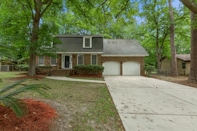 105 Spring St, Summerville, SC 29485 - view of front of house with a garage, brick siding, a shingled roof, and concrete driveway