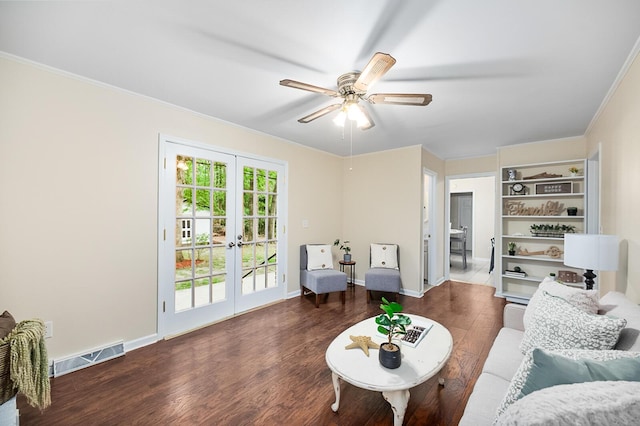 105 Spring St, Summerville, SC 29485 - living area with wood finished floors, crown molding, french doors, a ceiling fan, and built in shelves